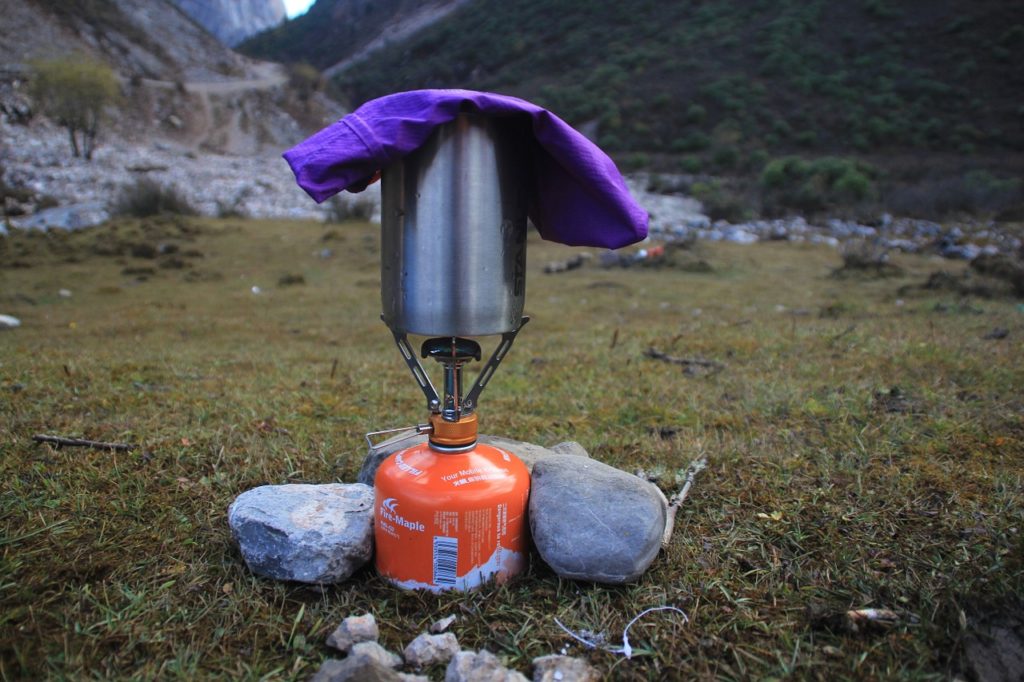 Boiling water with a camp stove