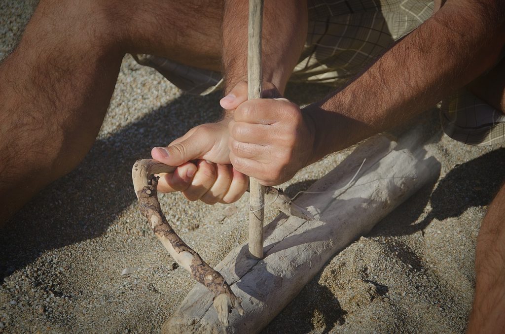 Fire Making with a Bow Drill