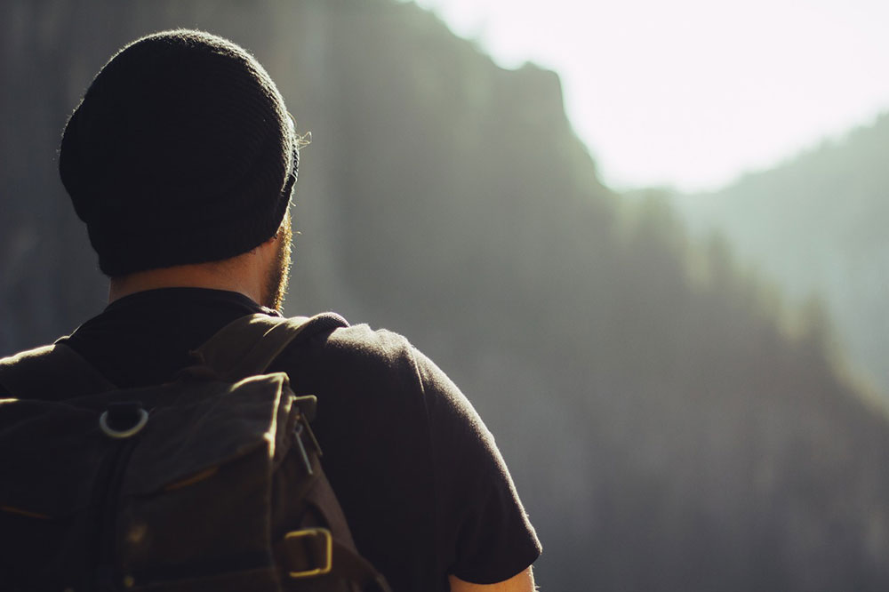 Hiking man from behind (closeup)