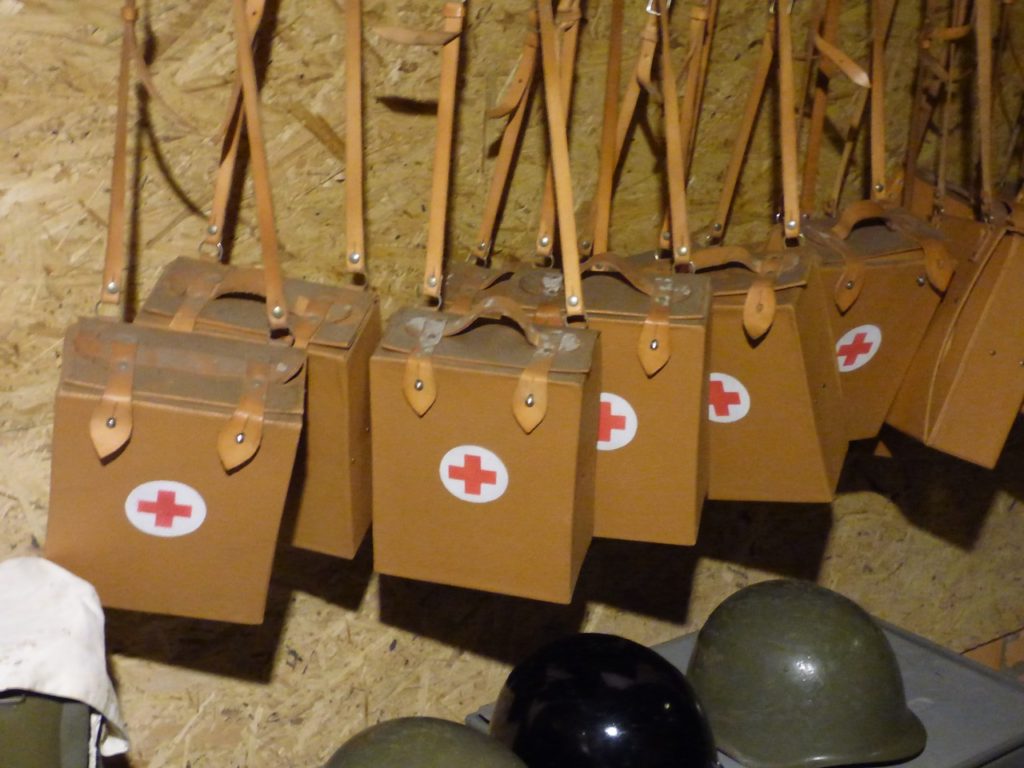 Vintage first aid kits in a bunker